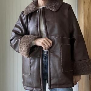 brown oversized jacket with faux leather and shearling